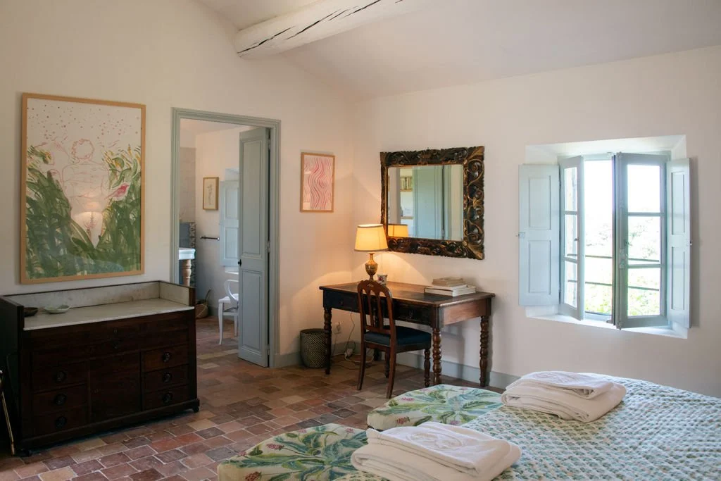 Spacious guest room at La Grange Neuve