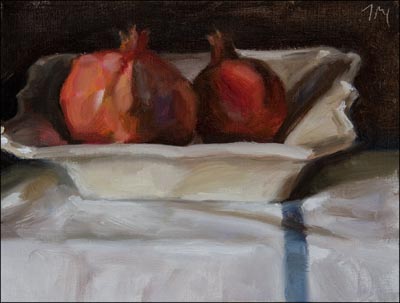 daily painting titled Two Pomegranates in a White Dish