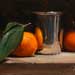Clementines and silver cup
